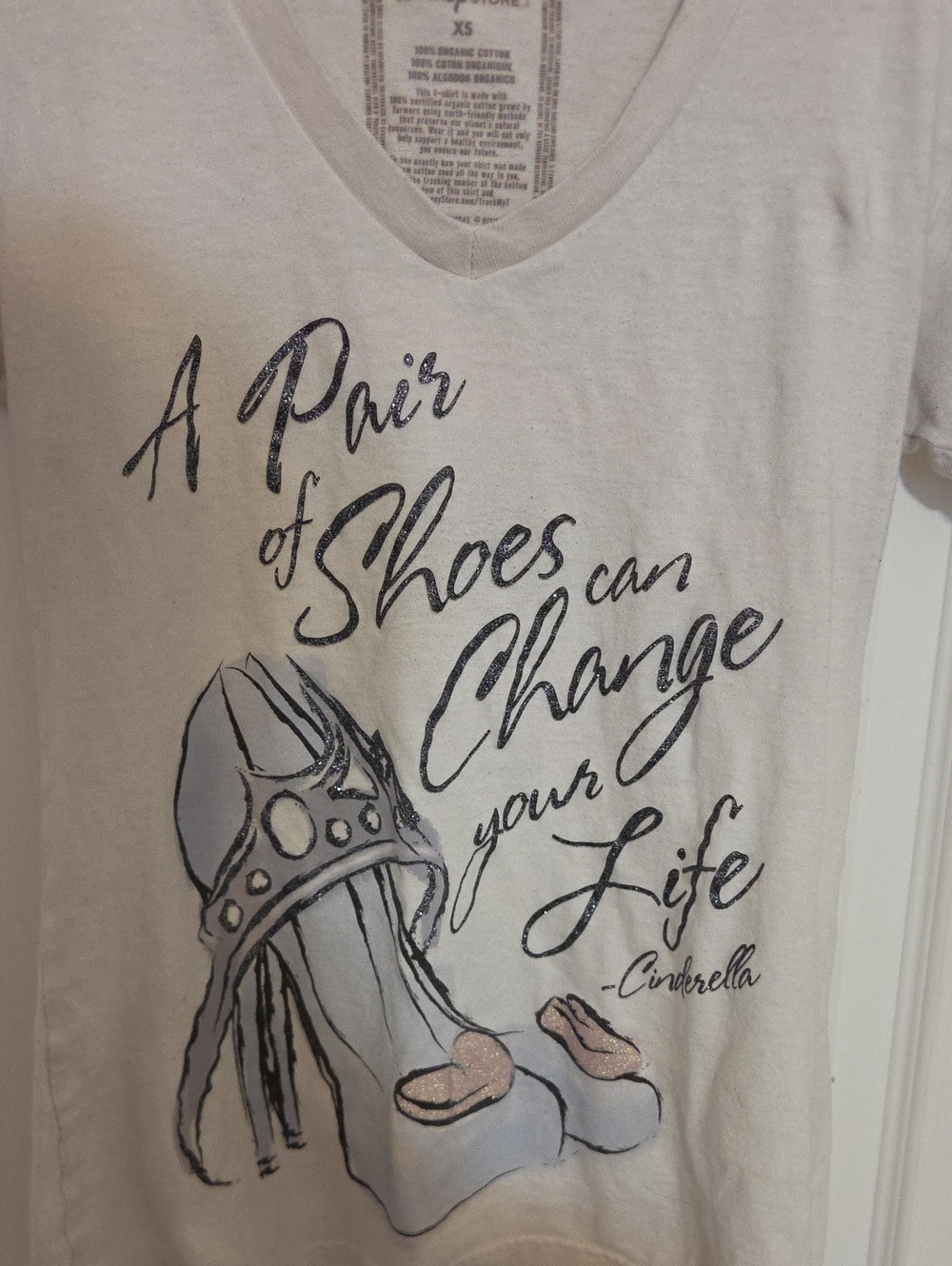 Disney Cream V‑Neck Tee with Navy Script and Soft Blue Illustration